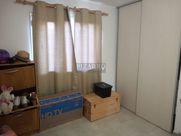 Retasado !! Duplex tres dormitorios con patio y cochera.